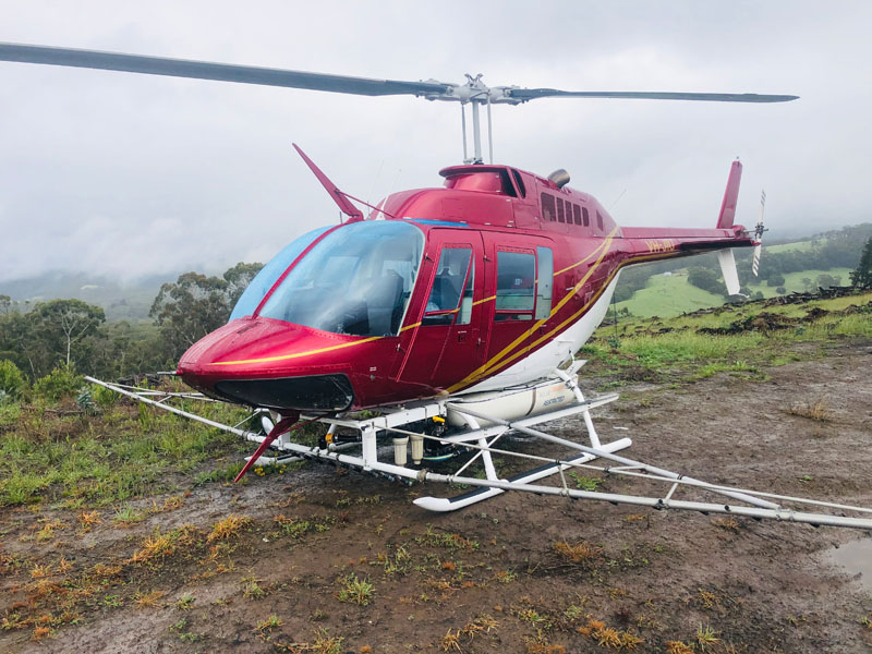 county helicopter ready for forest spraying