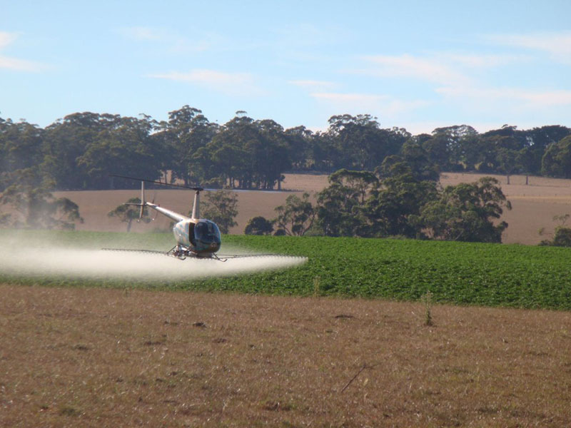 county helicopters aerial crop spraying in helicopter 2