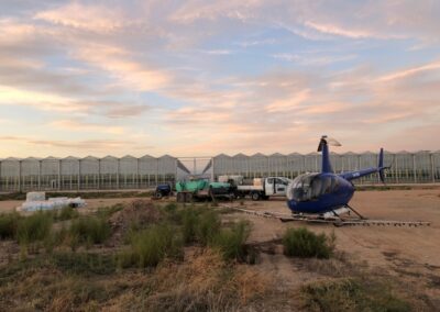 helicopter landed outside greenhouse