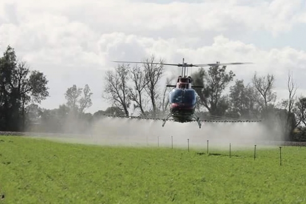 county helicopters aerial crop spraying in helicopter