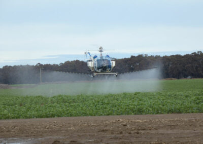 aerial agriculture spraying Bell helicopter