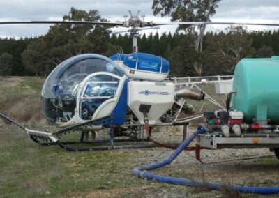 helicopter resupplying for forestry spraying work